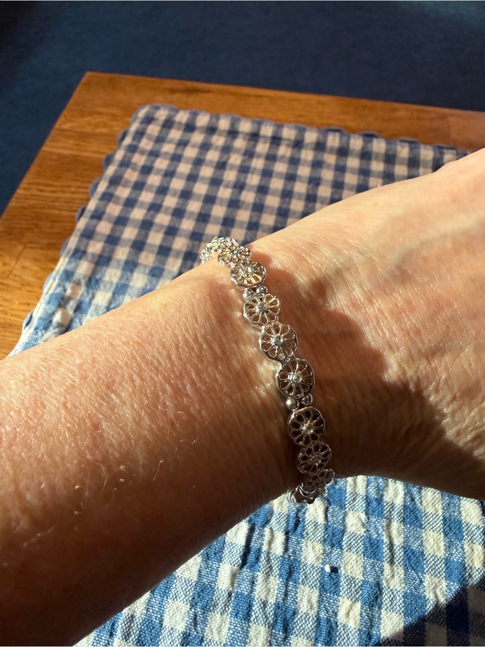 silver-tone link bracelet circular, floral filigree w/central stone 7”slip on